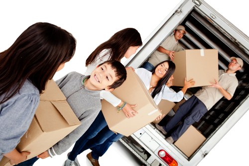 House removals in Acton with a moving van on a residential street