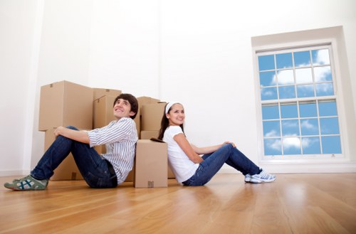 Business storage pricing example with stacked boxes and office items in Acton