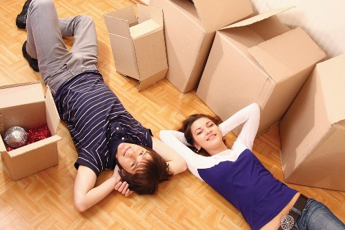 Acton resident organizing boxes into a mobile self storage container