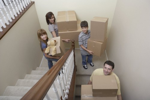 Boxes and furniture arranged inside an Acton storage unit